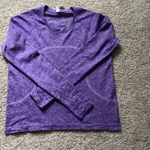 Lululemon Athletica Heathered swiftly Purple Top. Size 12. Excellent condition